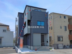 草加市金明町